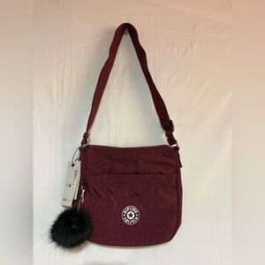 Kipling Maroon Crossbody Bag with Black Pom Pom
